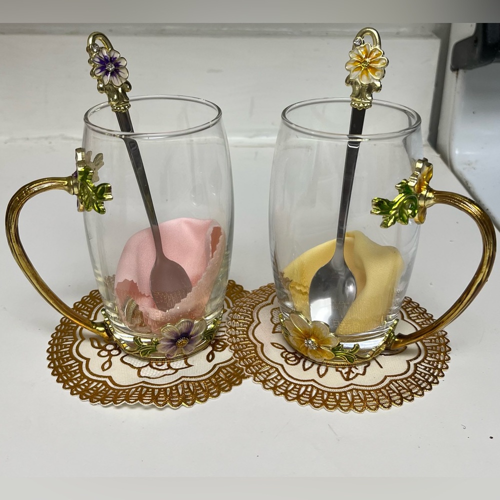Elegant Glass Mugs with Floral Spoons